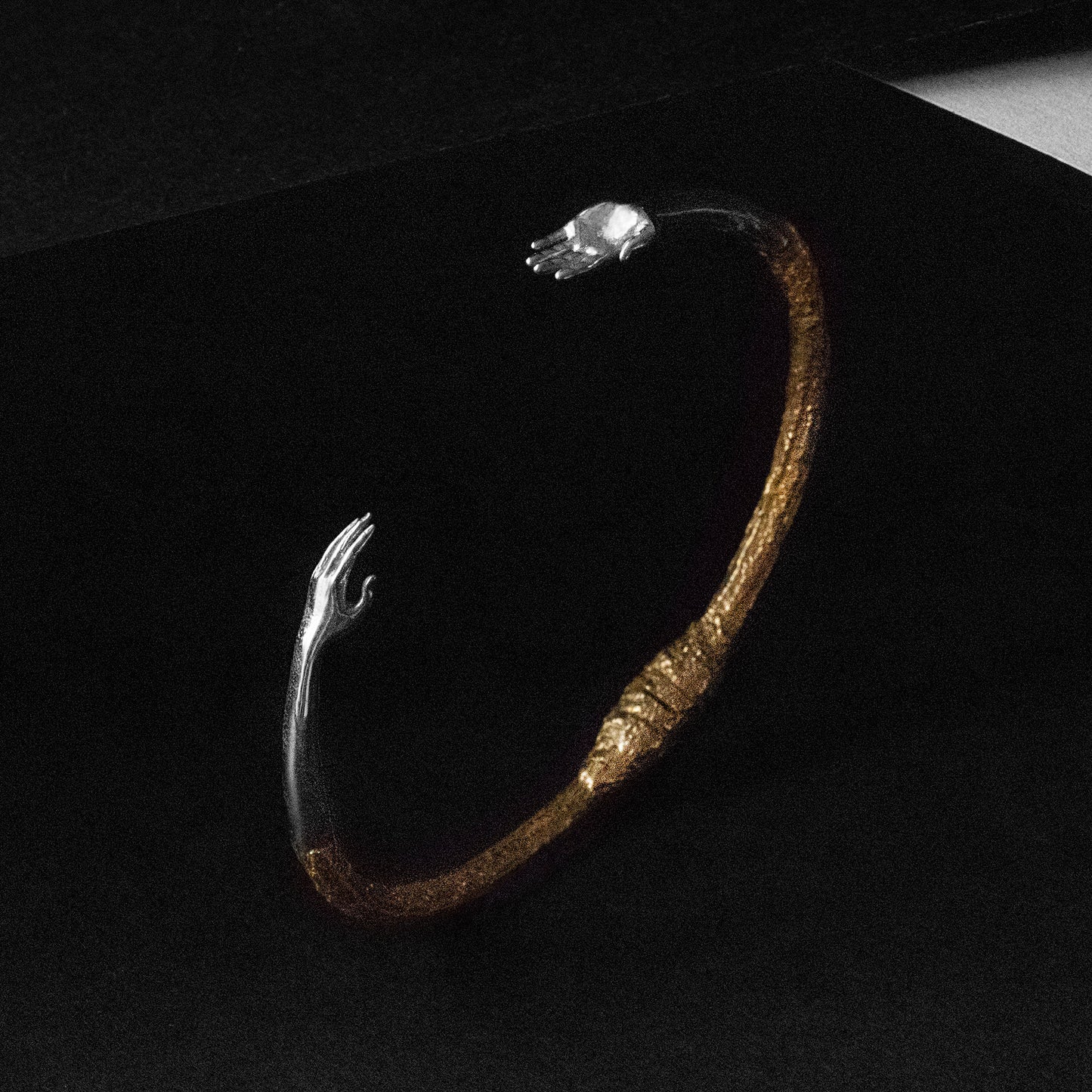 Reaching Hands Bracelet