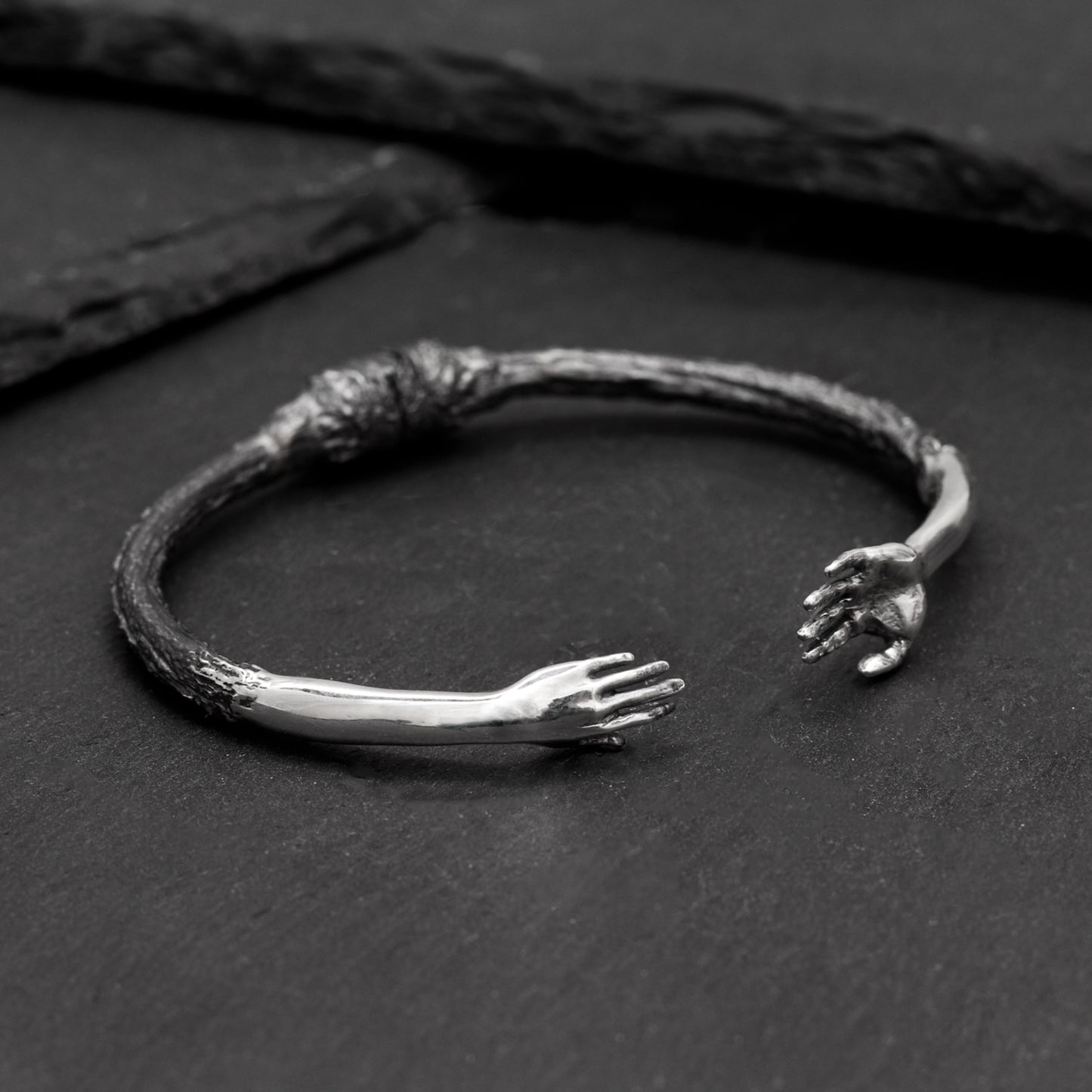 Reaching Hands Bracelet