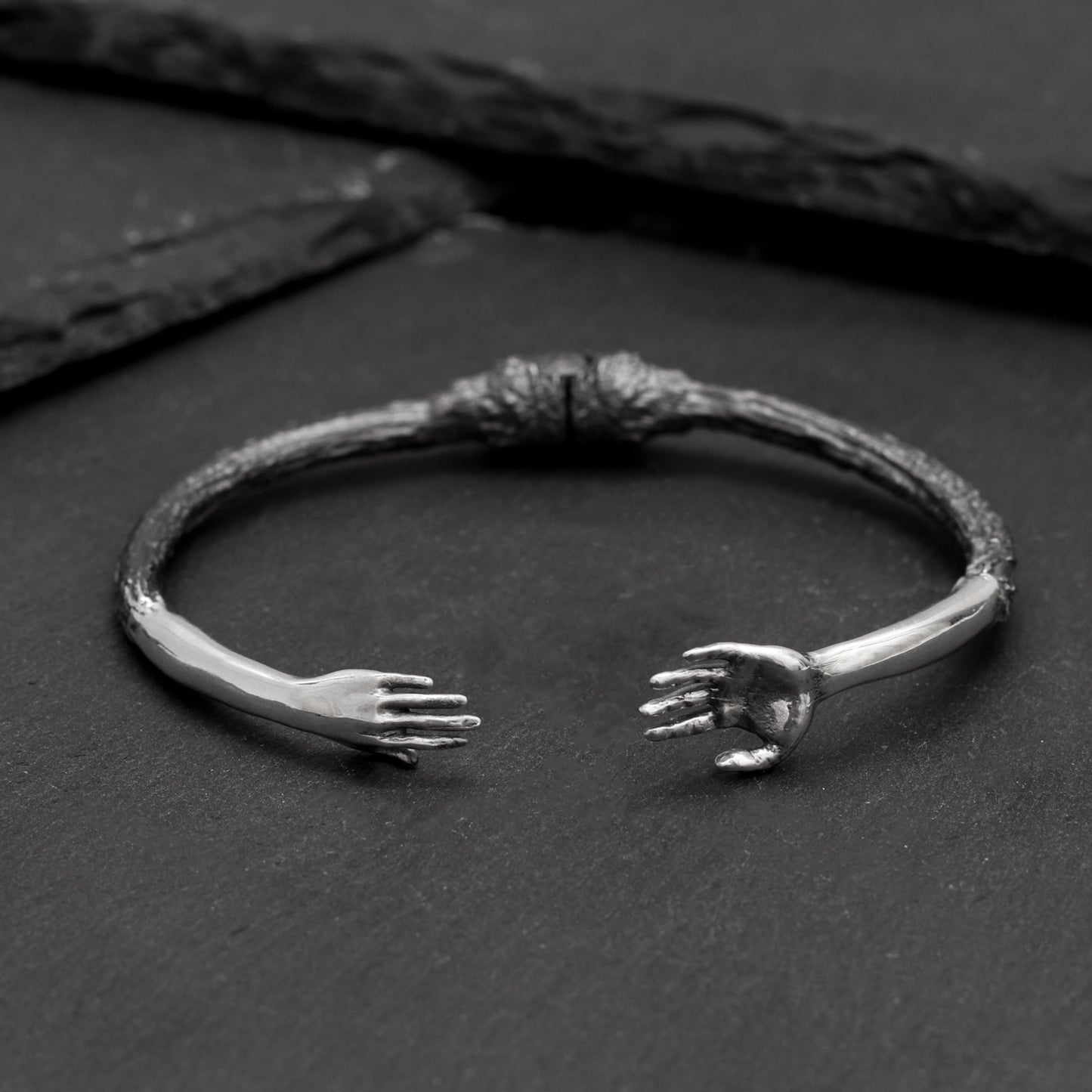 Reaching Hands Bracelet