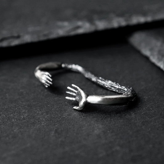 Reaching Hands Double Finger Ring