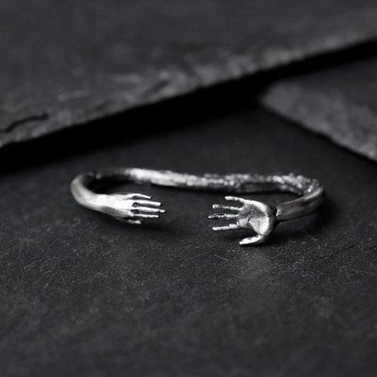 Reaching Hands Double Finger Ring